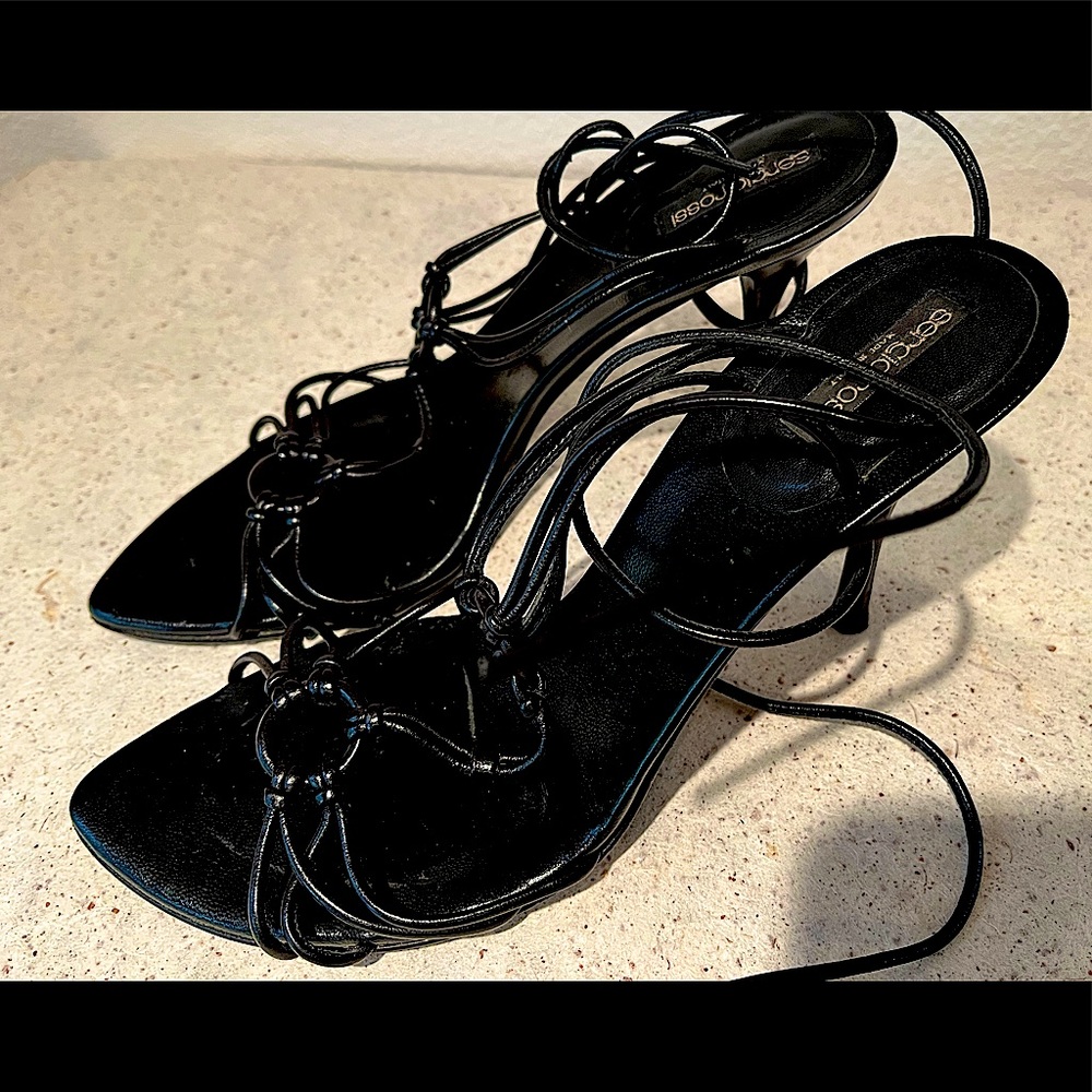 Sergio Rossi black high heeled sandals ankle & instep lacings w/knotted circles.